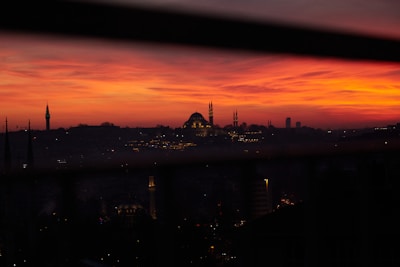 Sunset over a bustling Middle Eastern city where our outreach takes place.