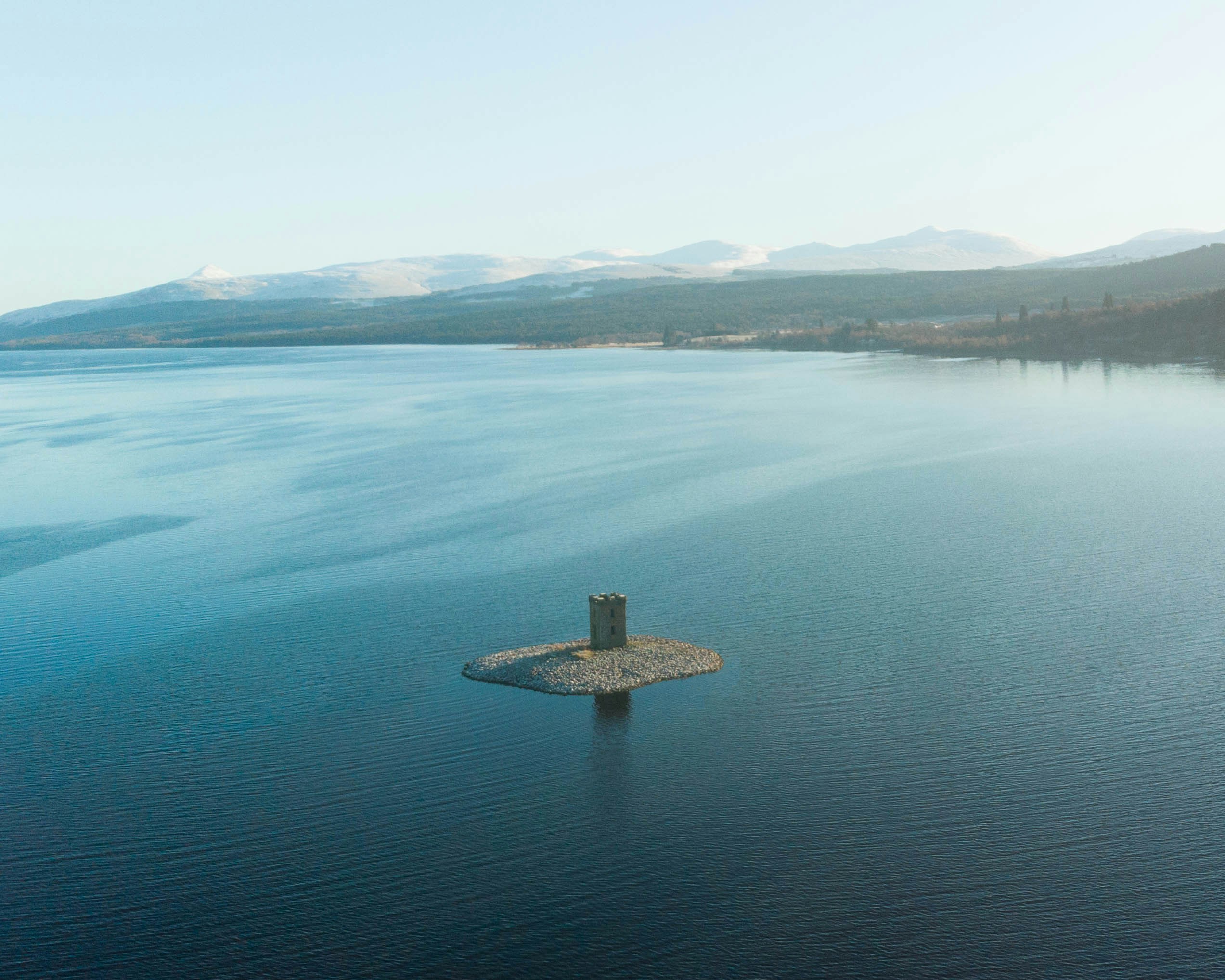 a small island in the middle of a large body of water