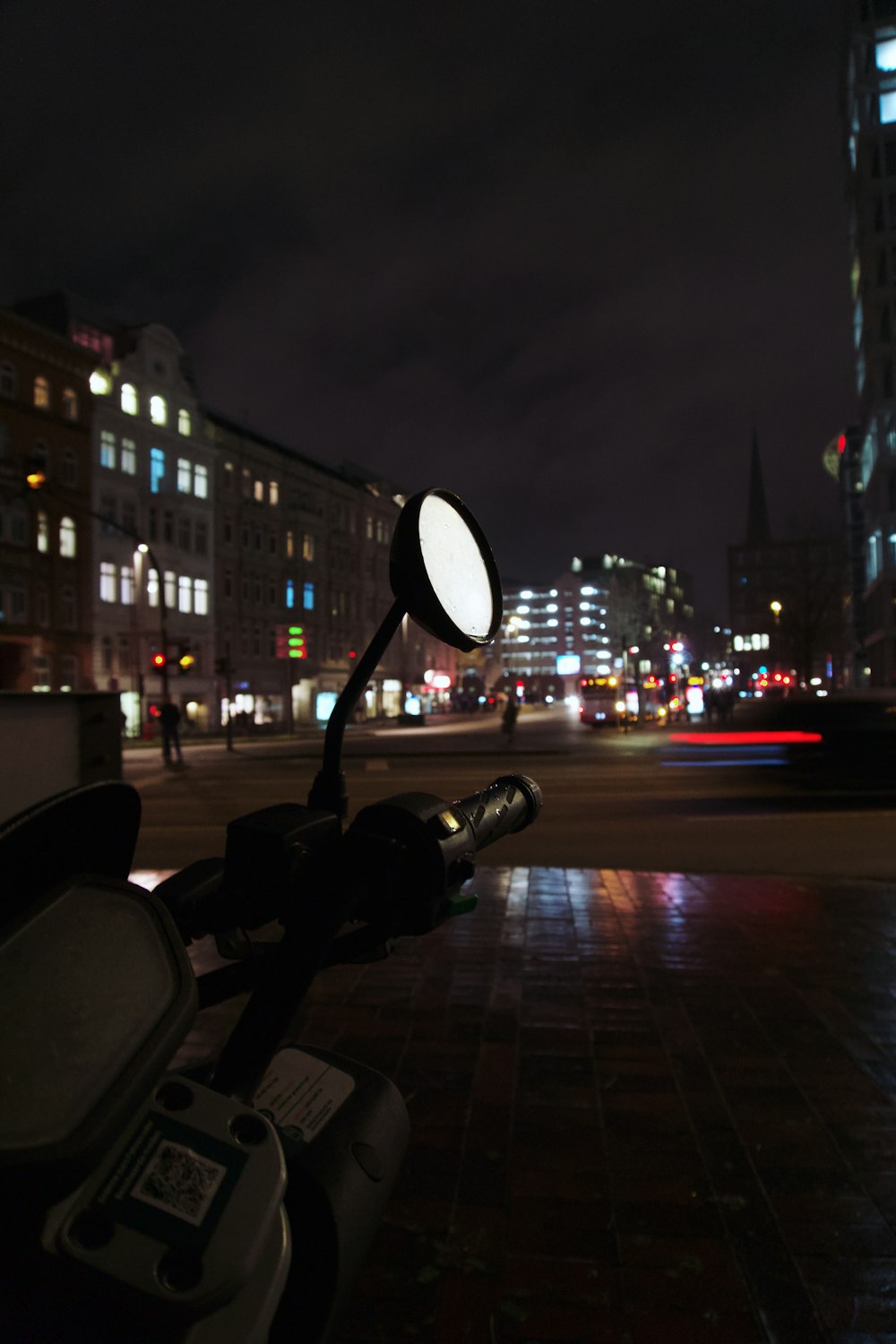 a street scene with focus on a street light