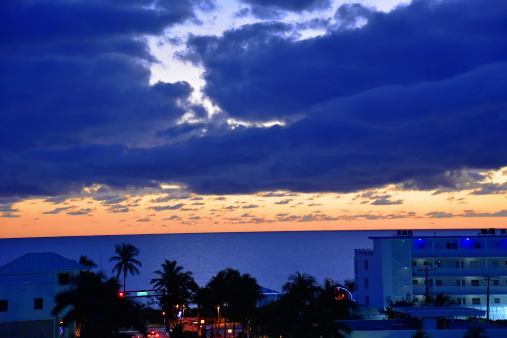 a view of the ocean from a high rise building