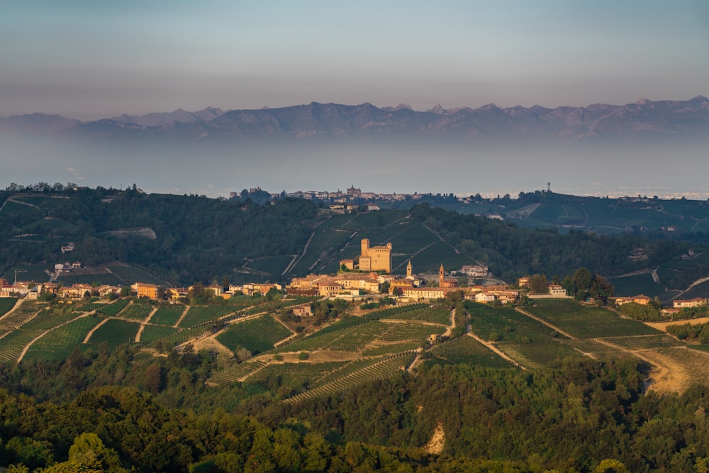 a view of a small village in the mountains