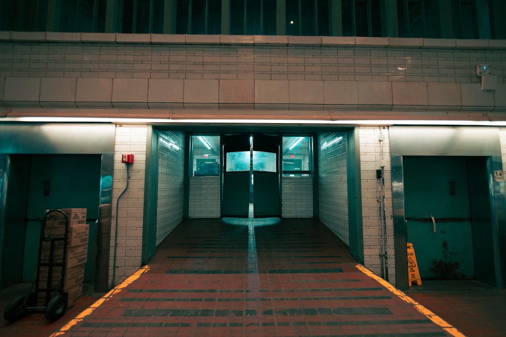 a building with two doors and a ramp leading to it