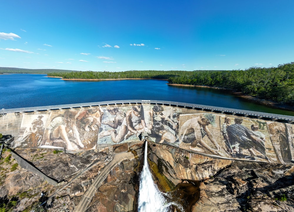 a dam with a painting on the side of it