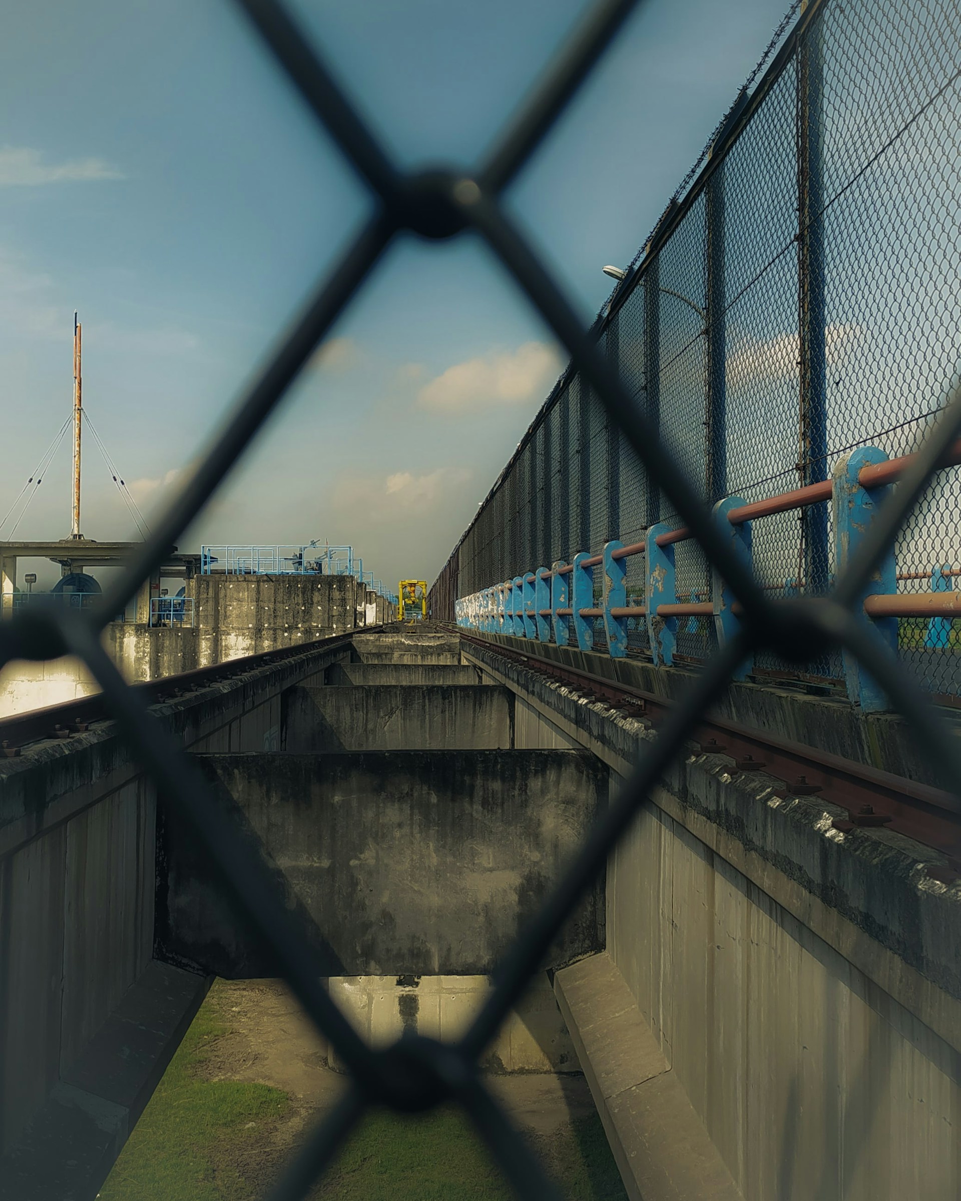 woman wearing yellow long-sleeved dress under white clouds and blue sky during daytime