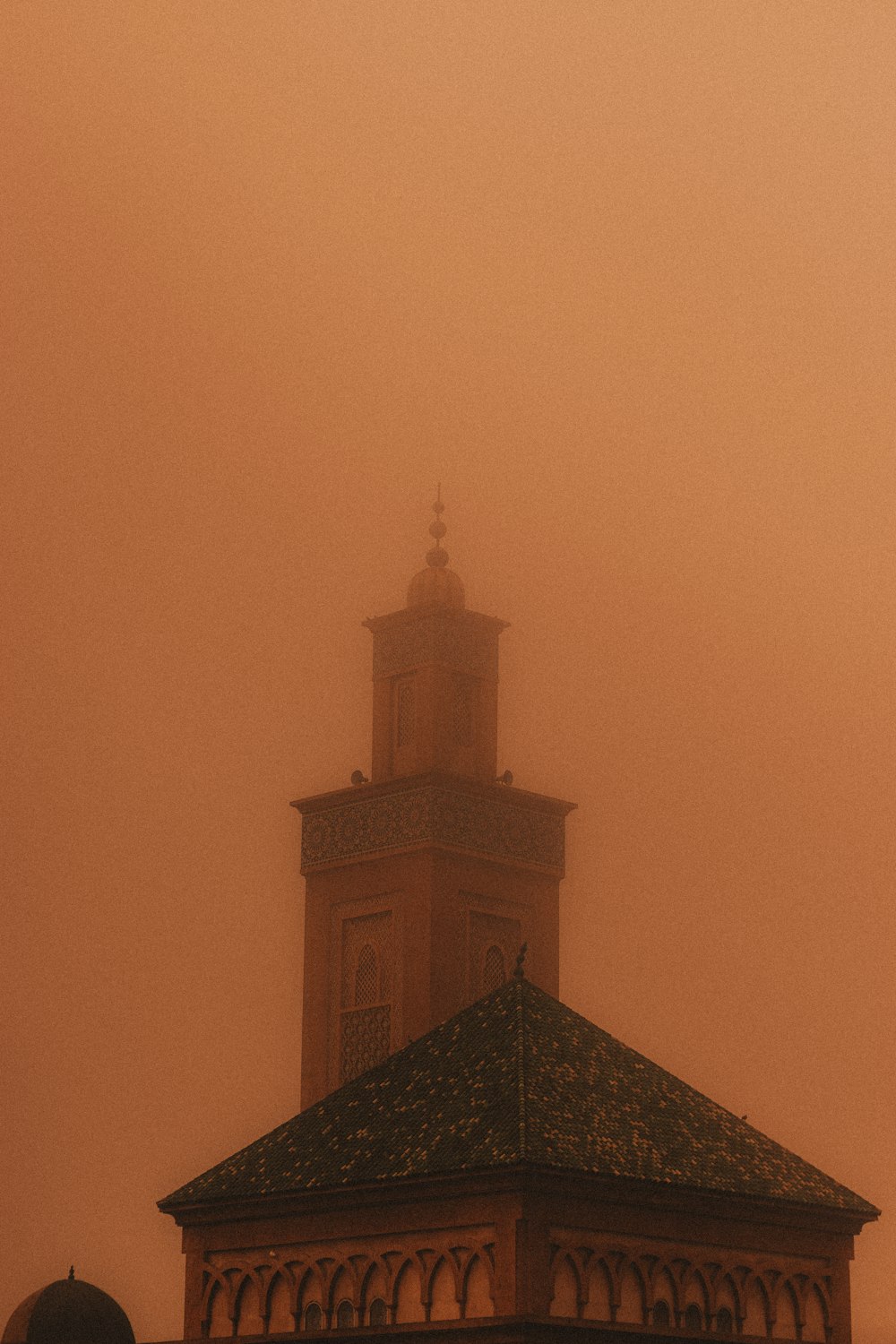 a building with a clock on the top of it