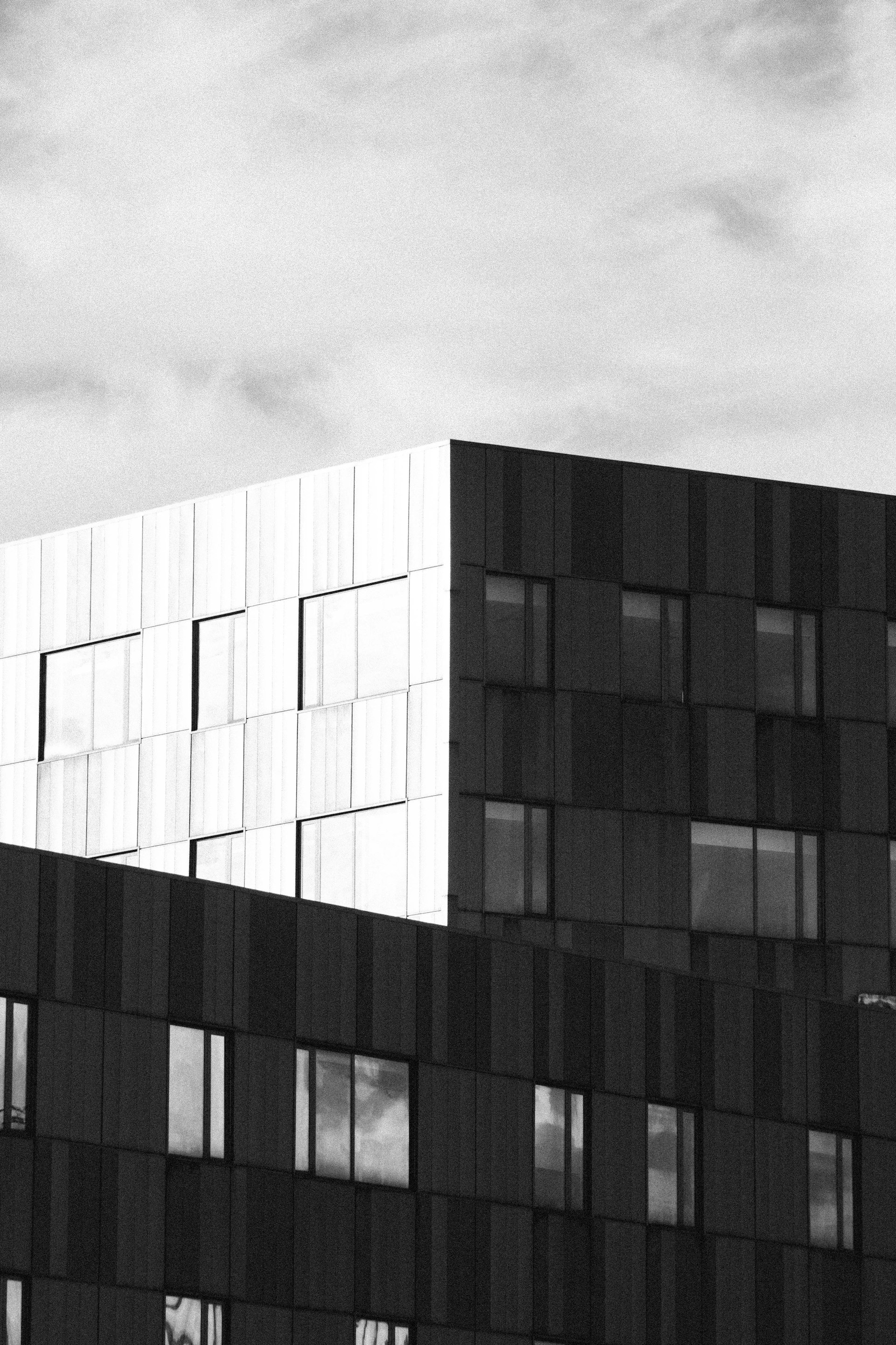 a black and white photo of a tall building