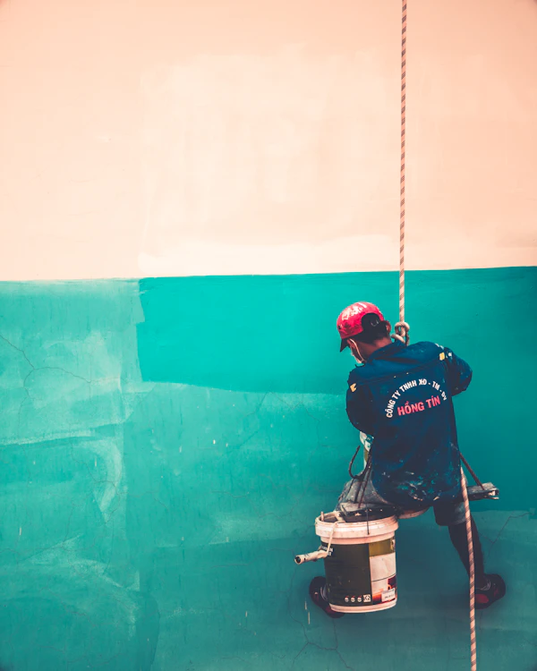 Professional painter using roller on wall – Gulberg Lahore