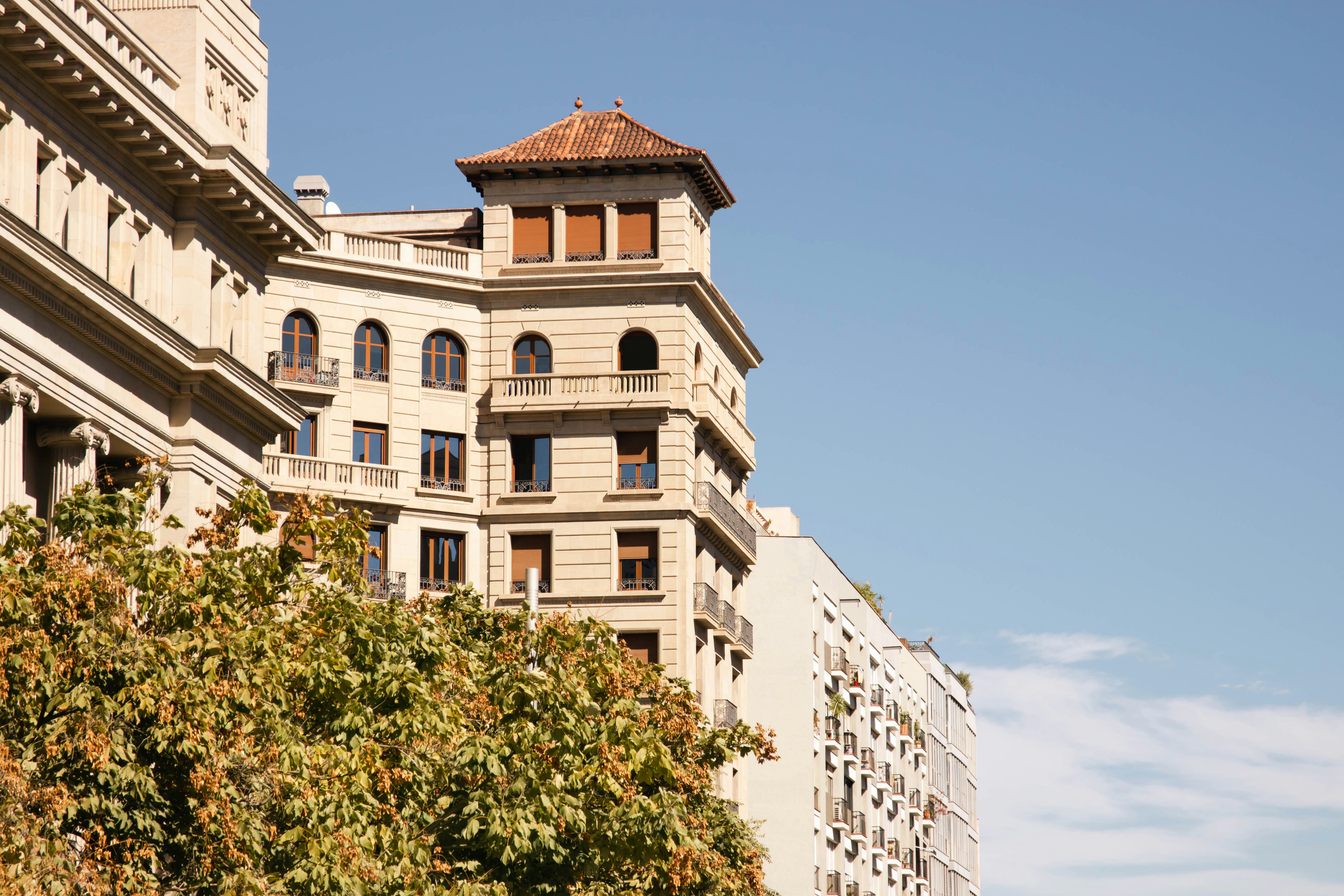 a tall building with a clock on the top of it