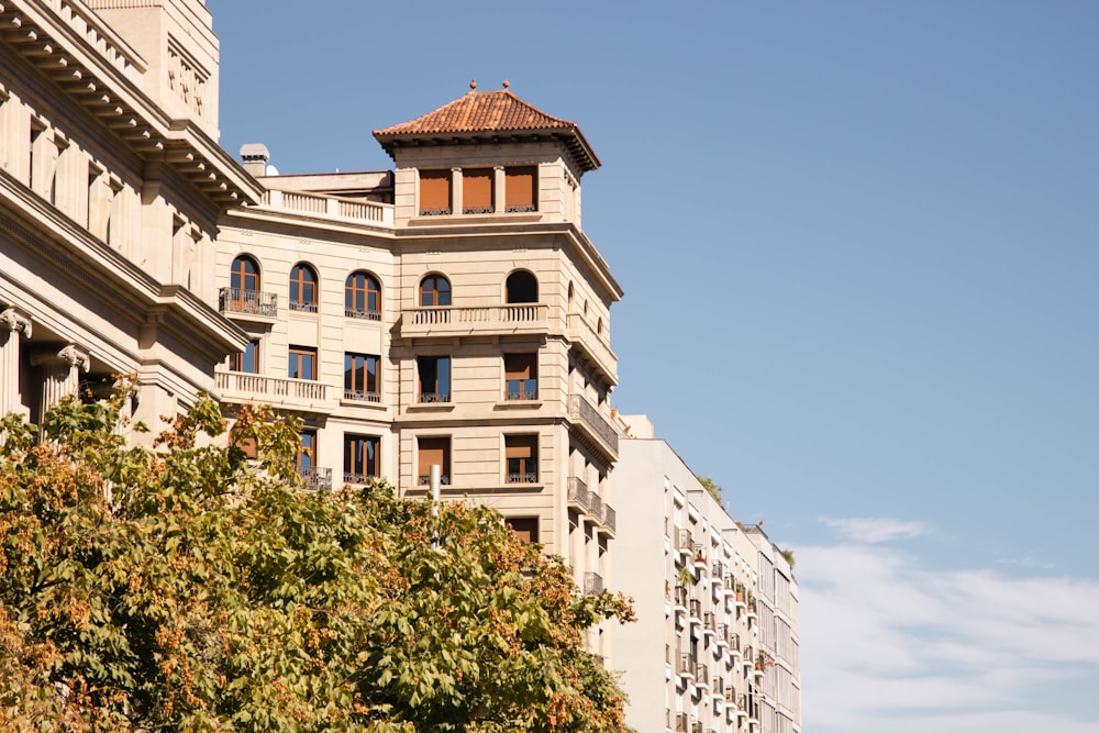 a tall building with a clock on the top of it