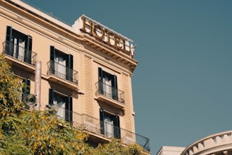 a hotel sign on top of a building