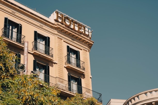 a hotel sign on top of a building