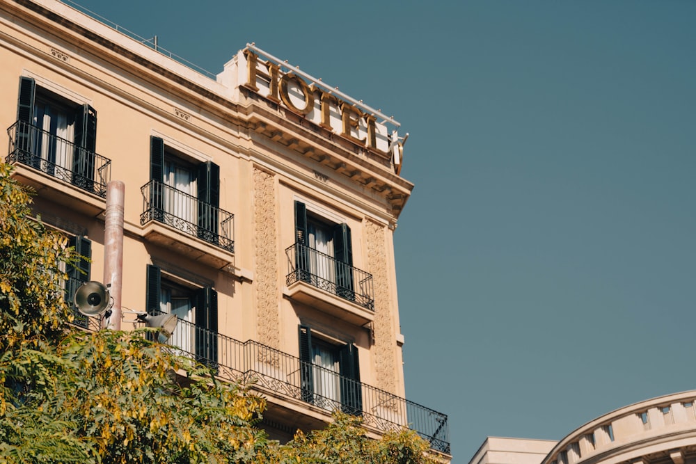 a hotel sign on top of a building