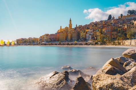 a view of a beach with a city in the background