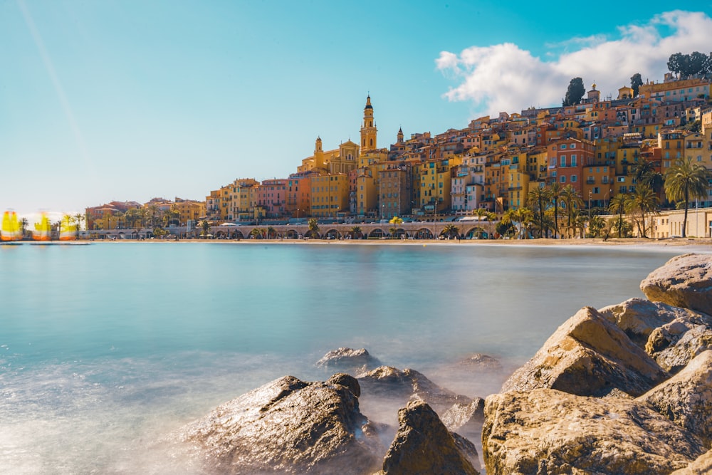 a view of a beach with a city in the background