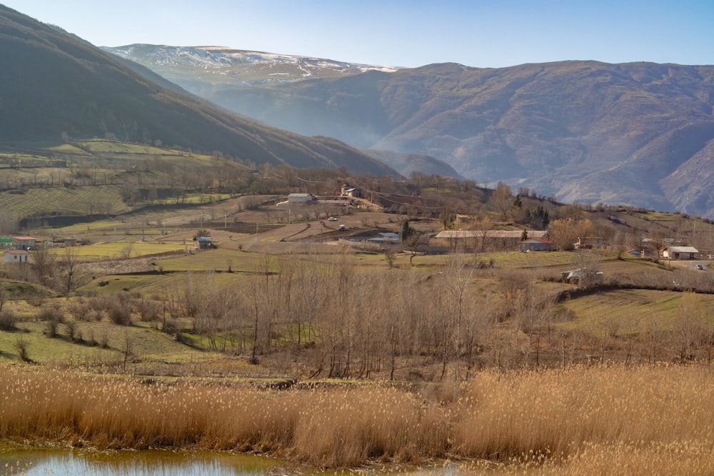 a view of a small village in the mountains