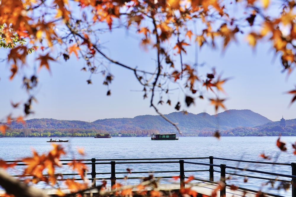 a boat floating on top of a large body of water