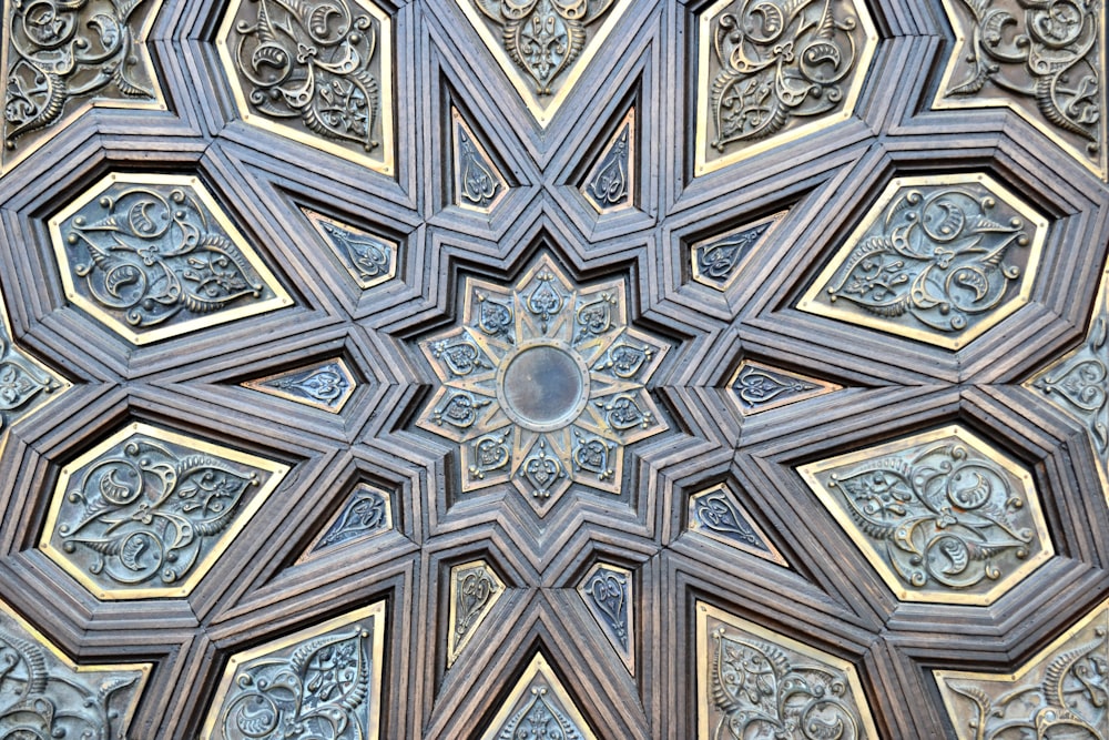 a close up of a decorative design on a building