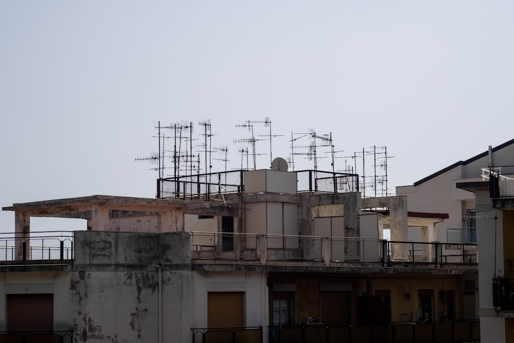 a building with lots of electrical wires on top of it