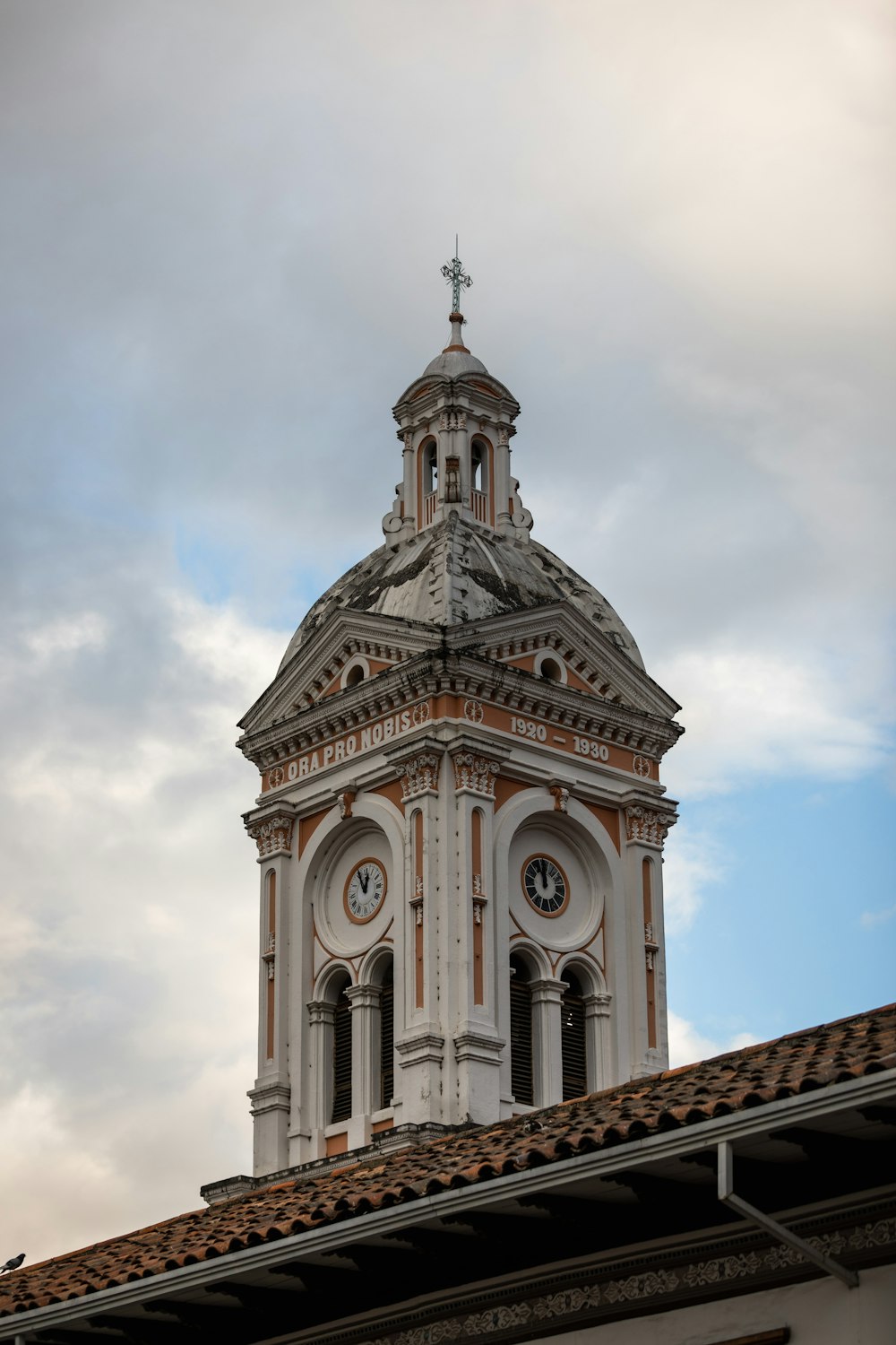 a tall tower with a clock on top of it