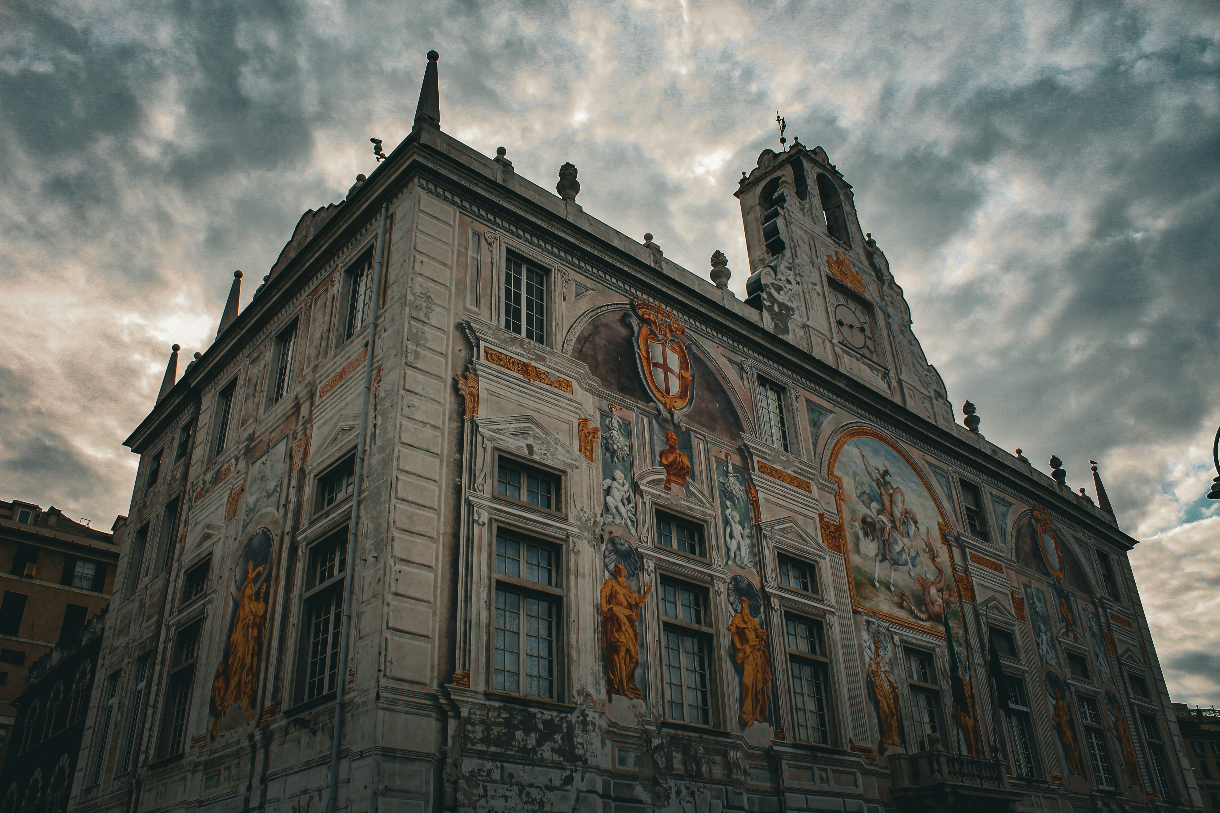 a large building with a clock on the side of it