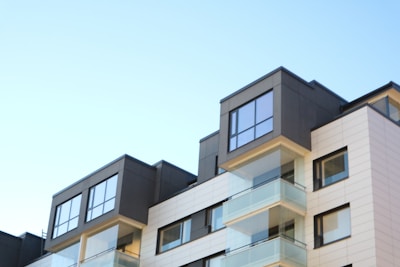 a multi - story building with balconies and balconies on the top