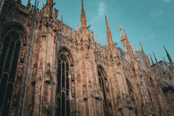 Close-up of the intricate façade of Toledo Cathedral with its gothic details.