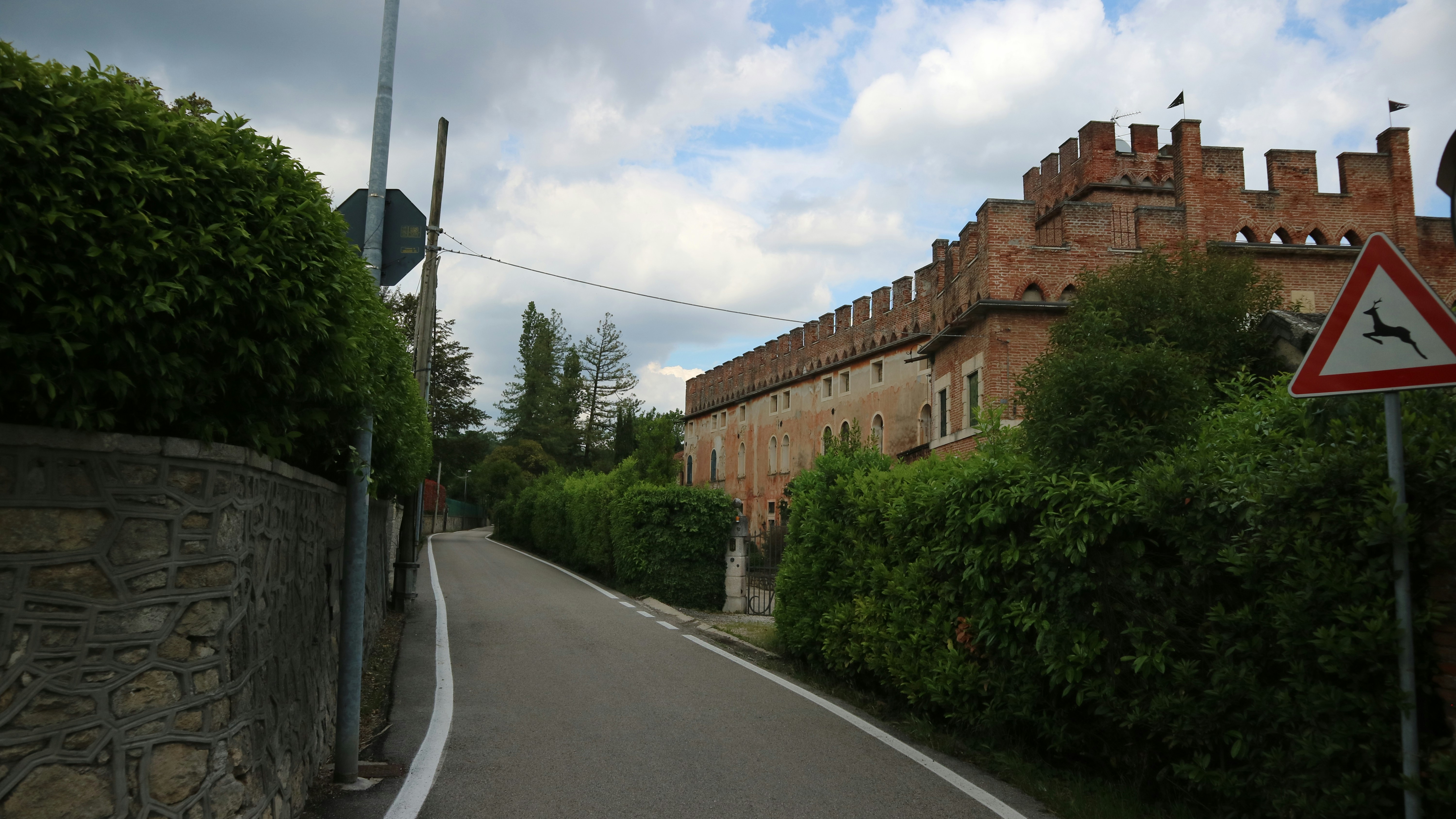 a road with a sign on the side of it