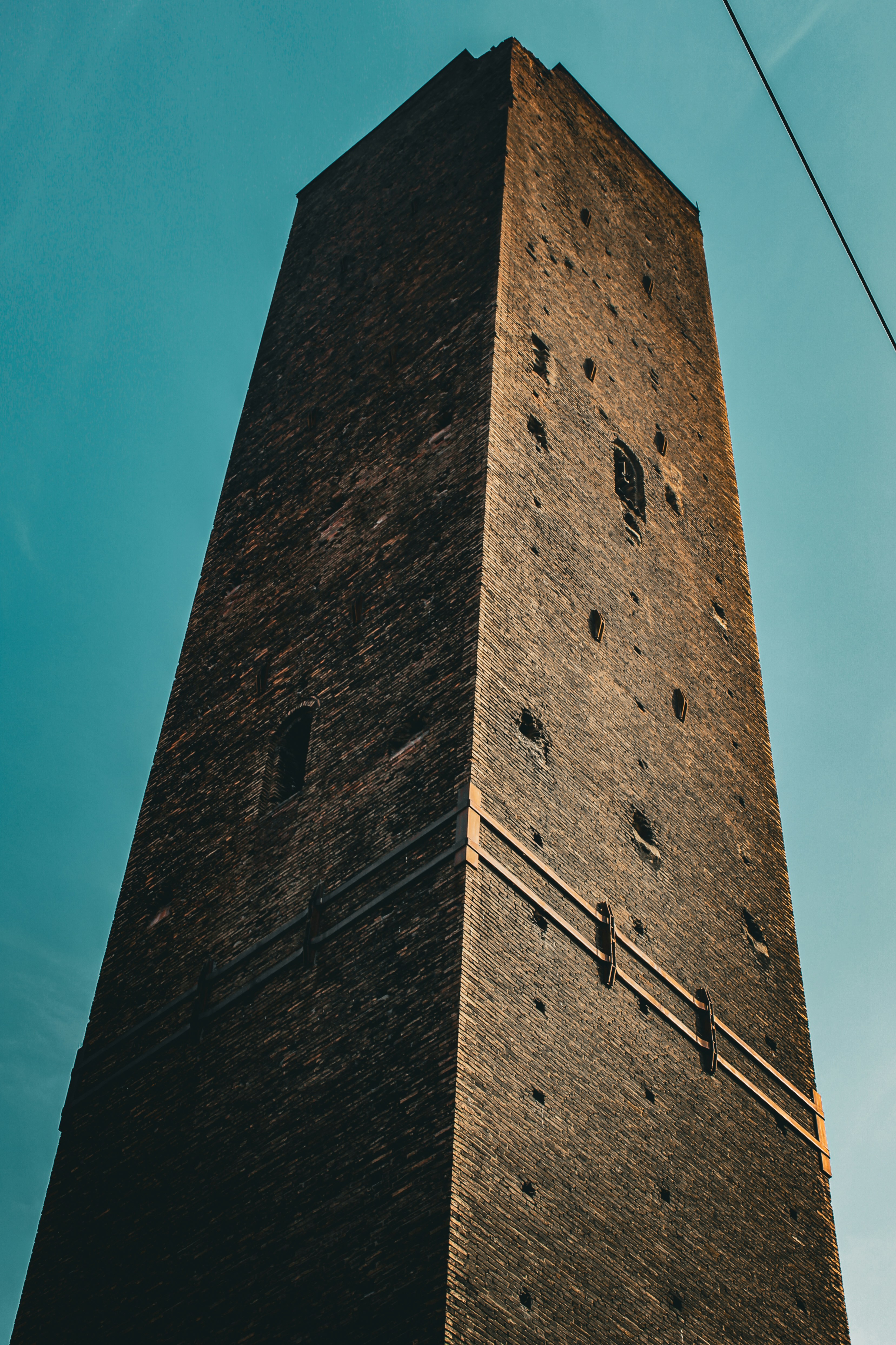a tall tower with a clock on the top of it