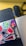 A happy customer using GetKitWork products on her laptop.