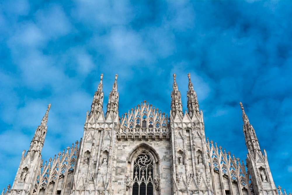 a large cathedral with a clock on the front of it