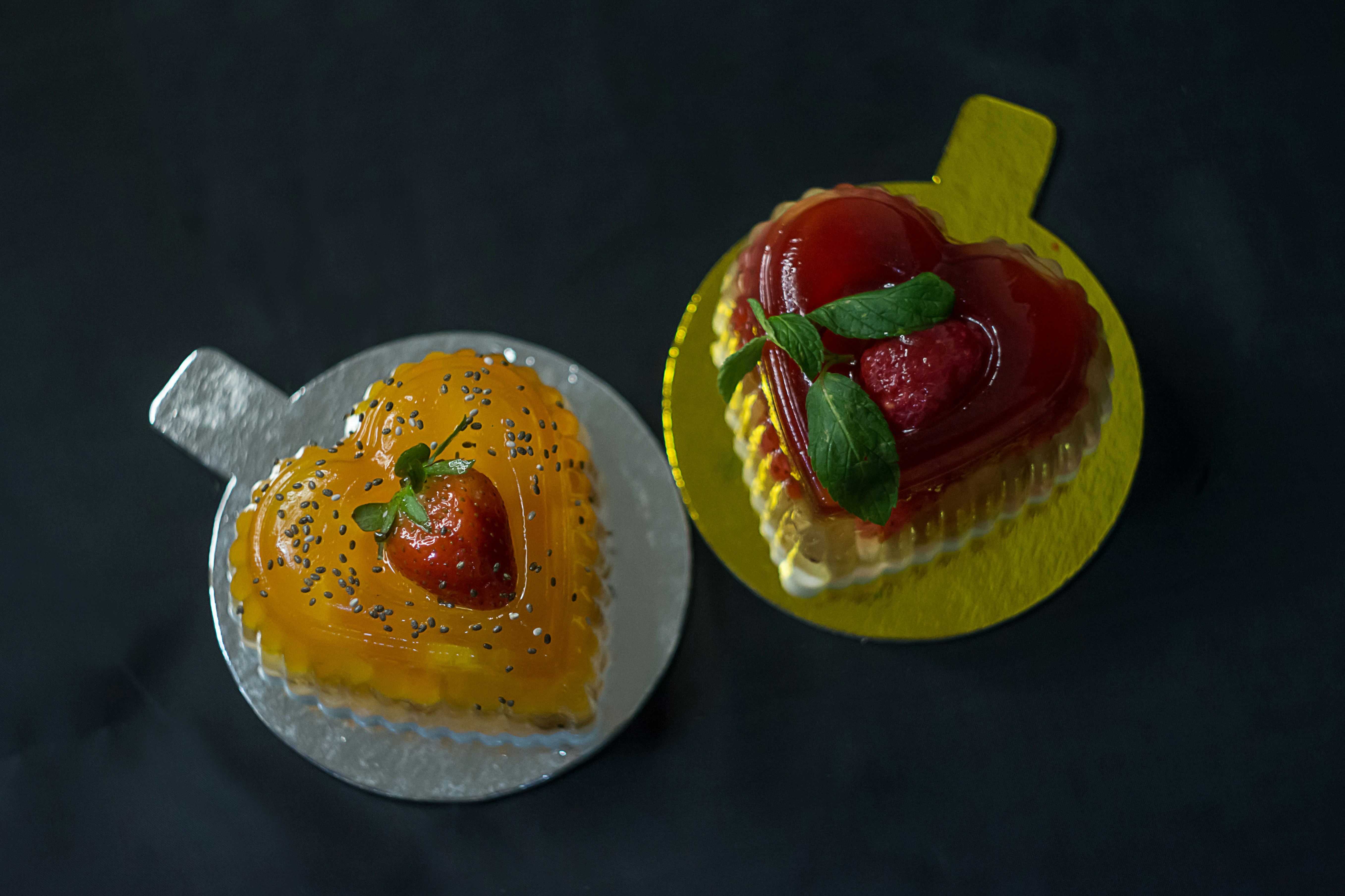 a couple of cakes sitting on top of a white plate