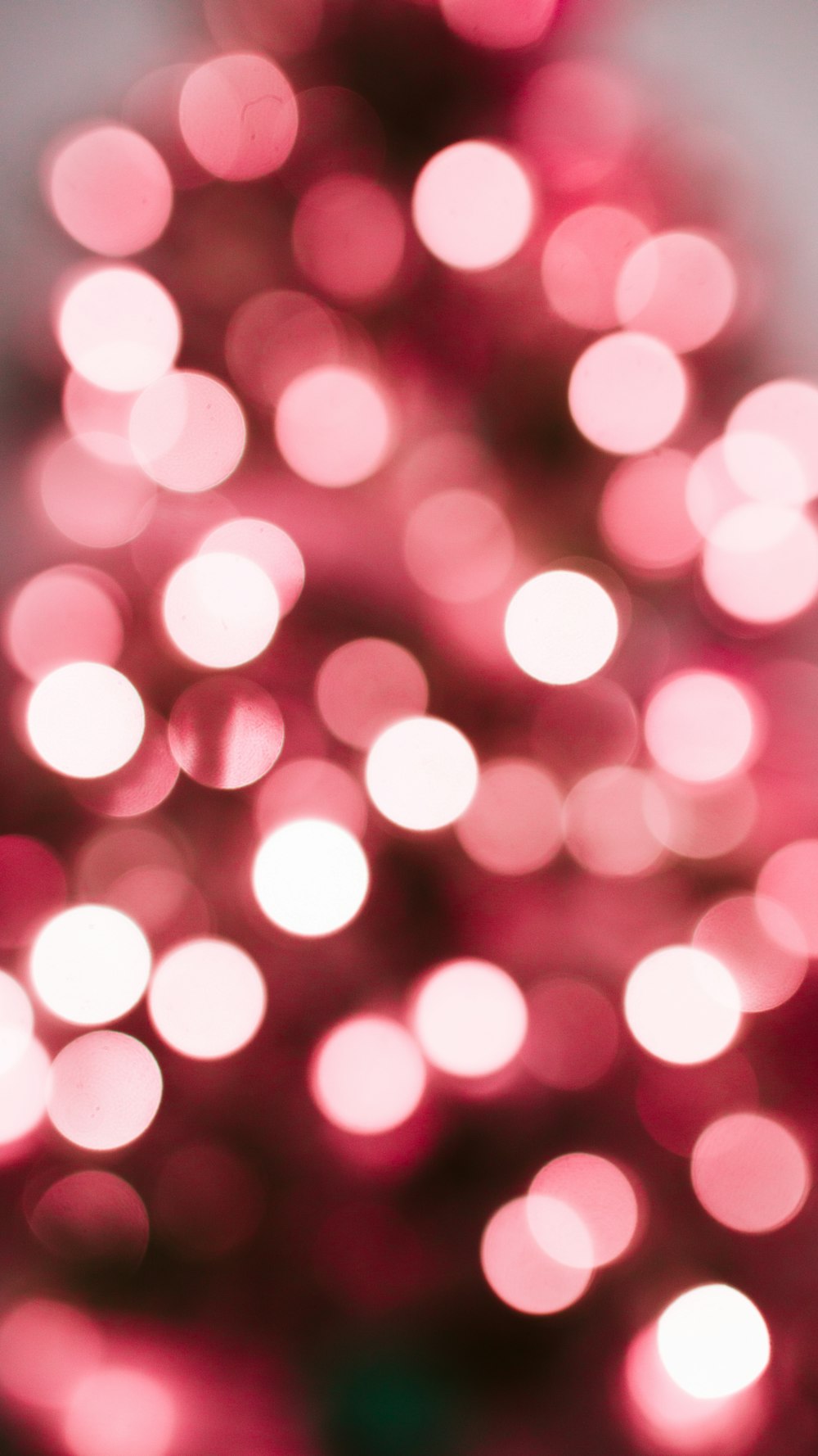 a close up of a pink christmas tree