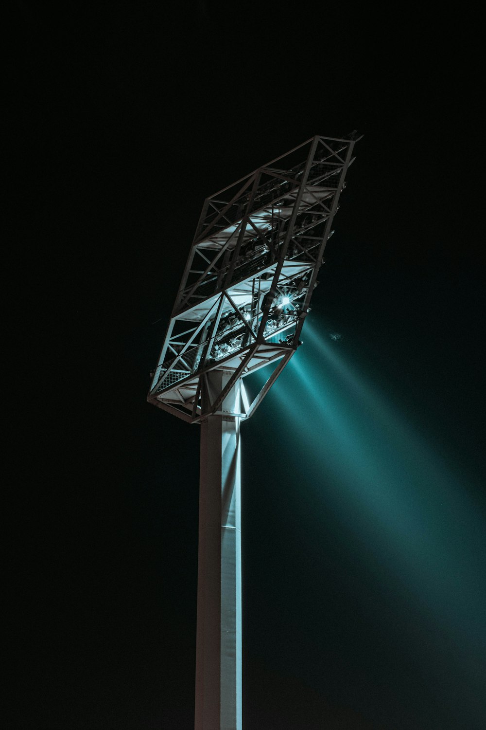 a tall tower with a light on top of it