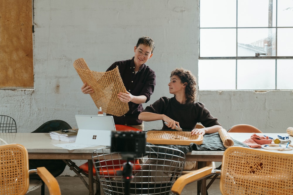 a man and a woman sitting at a table