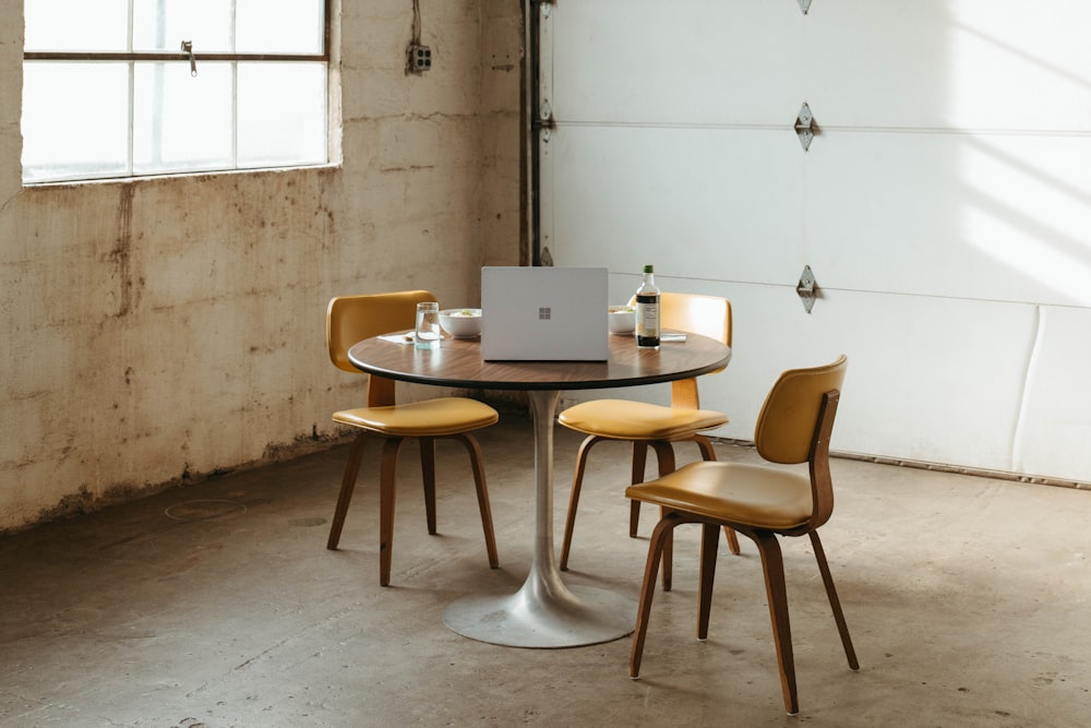 a table with a laptop on top of it