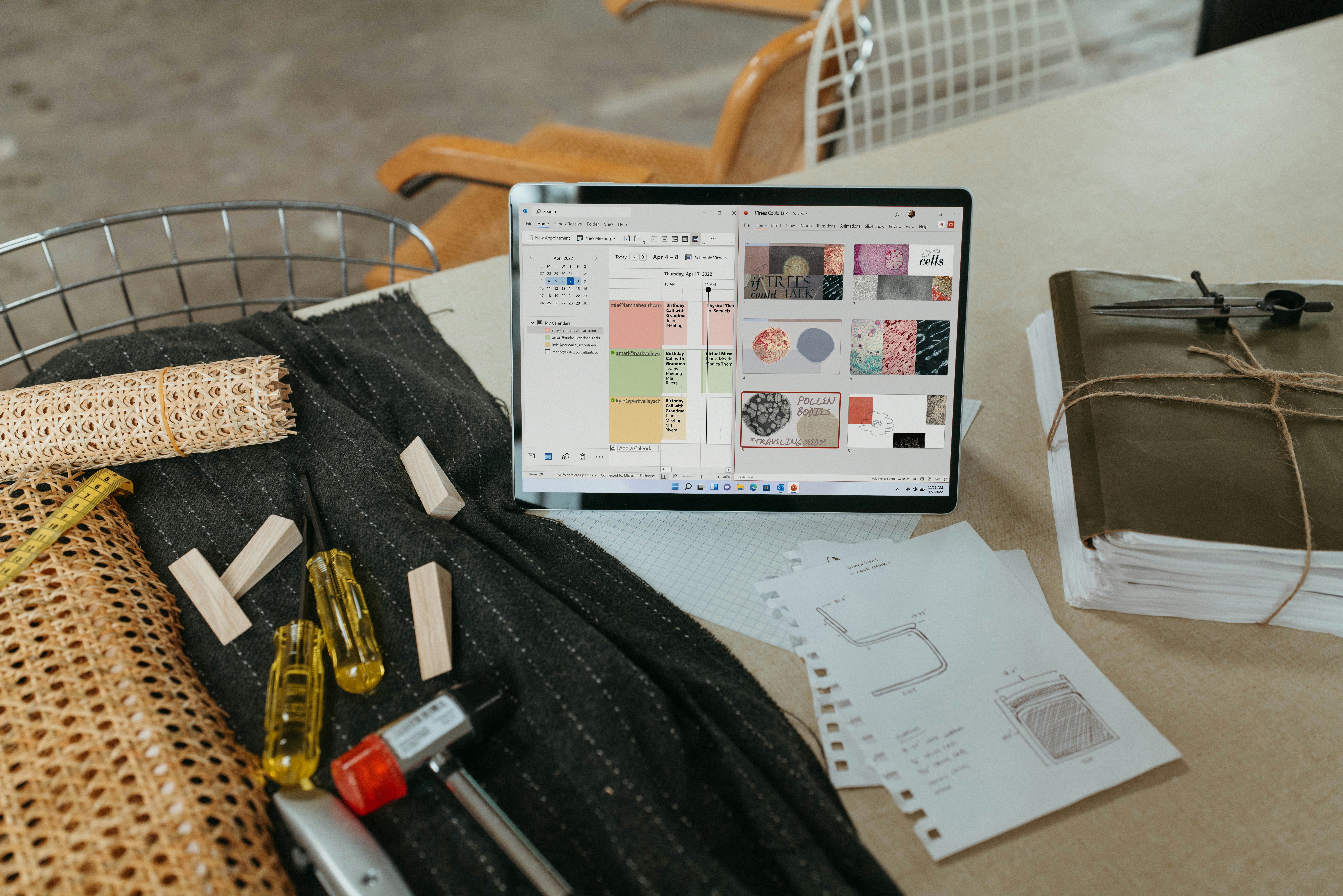 a laptop computer sitting on top of a table