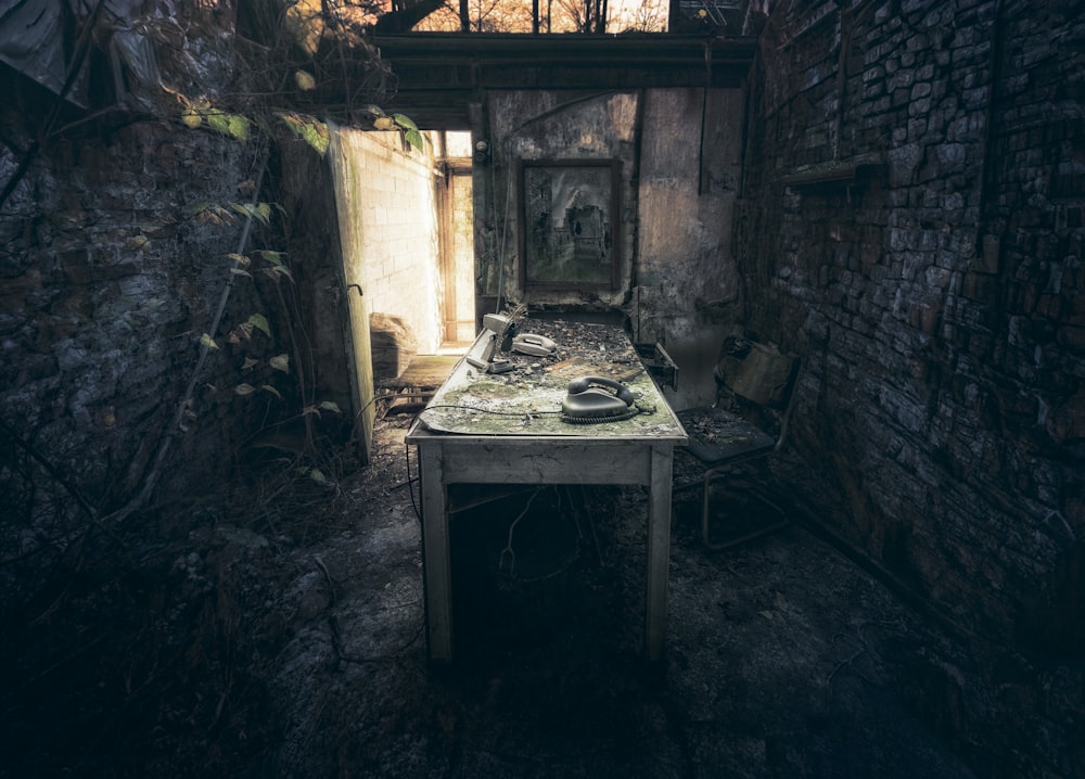 a room with a table and a mirror in it