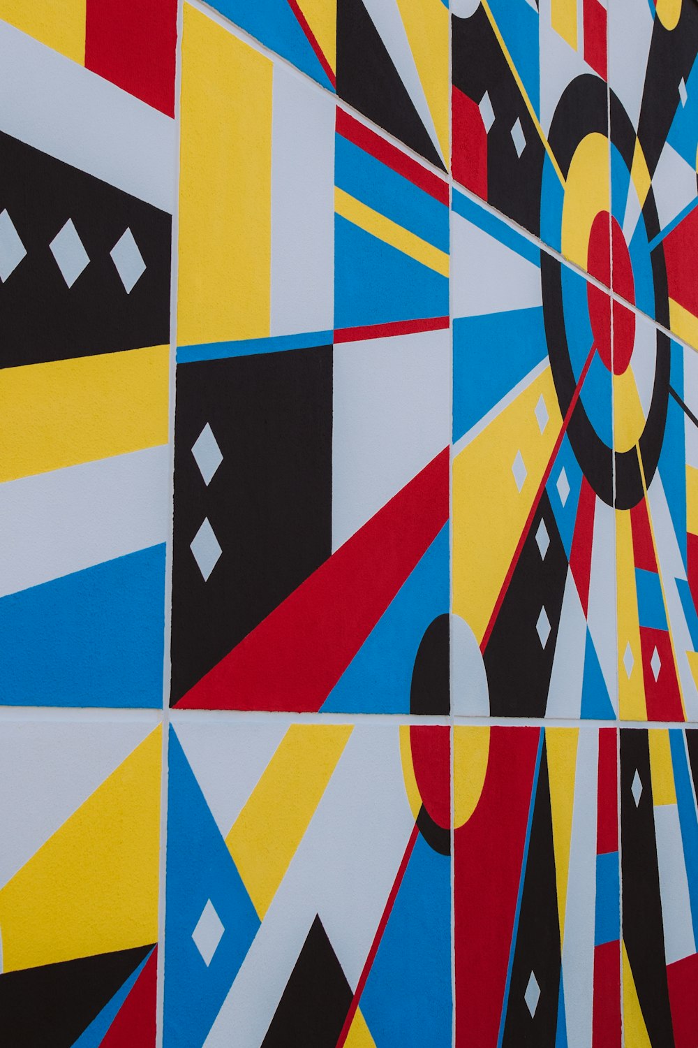 a painting of a colorful design on a wall