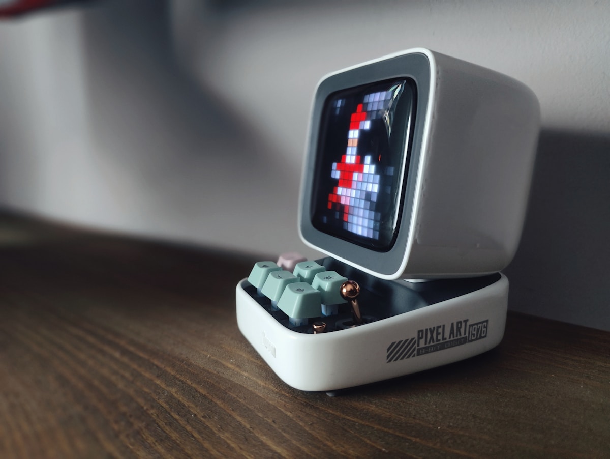 An old computer with a game on the screen