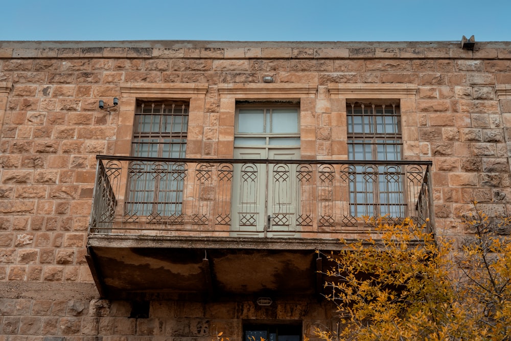 an old building with a balcony and balconies