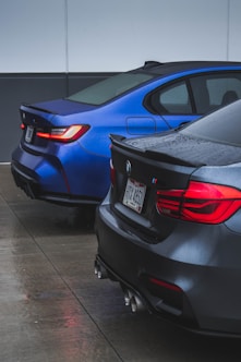 a couple of cars parked next to each other