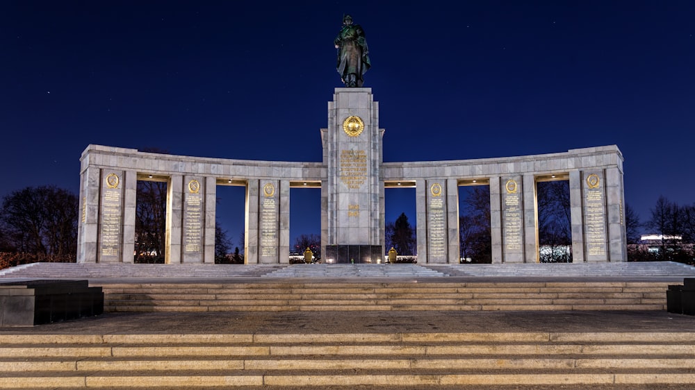 a large monument with a statue on top of it