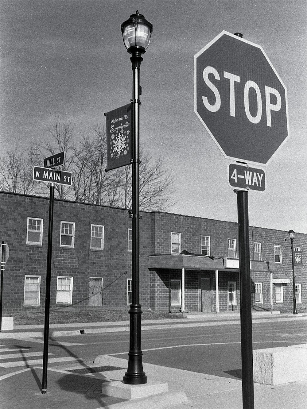 a black and white photo of a stop sign
