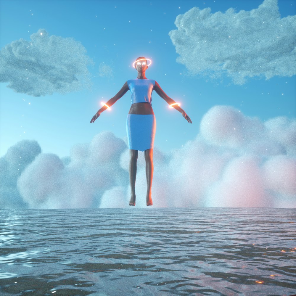a woman standing in the middle of a body of water