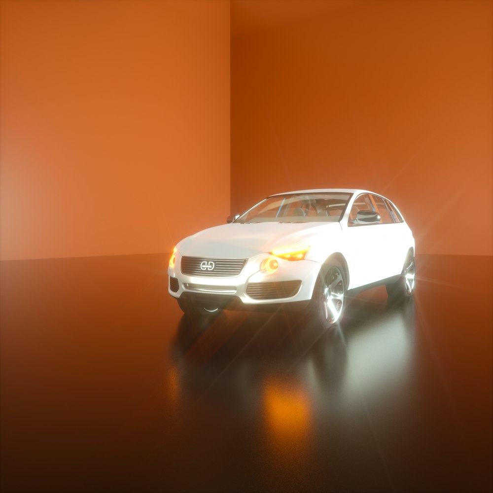 a white car in a room with orange walls