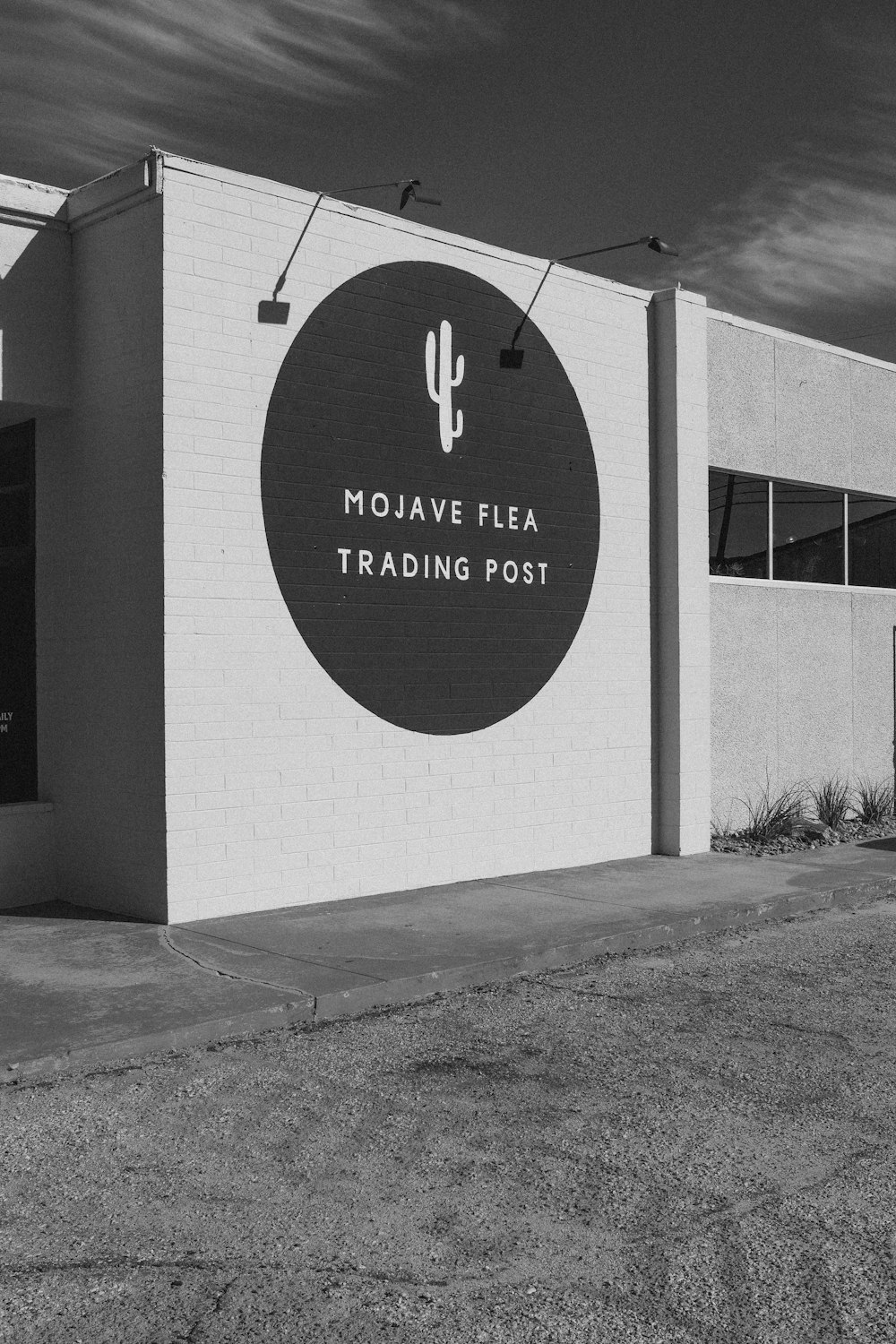 a black and white photo of the mojave tea trading post