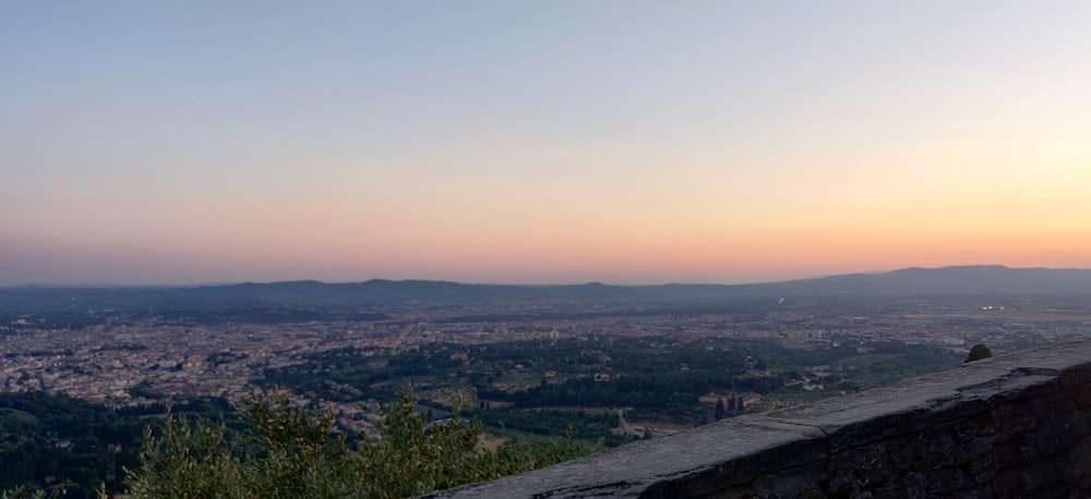 a view of a city from a hill top