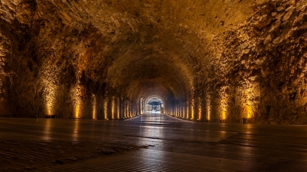 a long tunnel with a light at the end