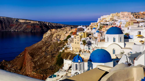 Whitewashed Imerovigli town on the edge of the Santorini caldera cliff