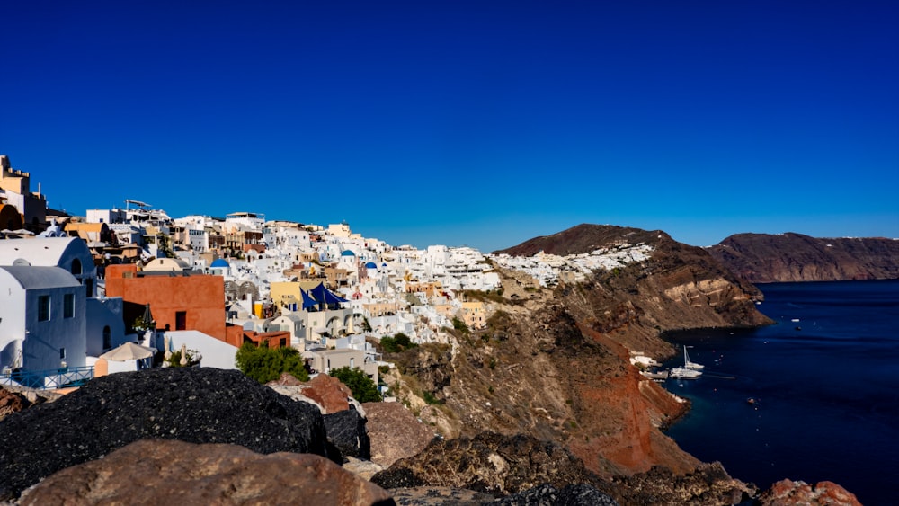 a view of a village on the side of a mountain